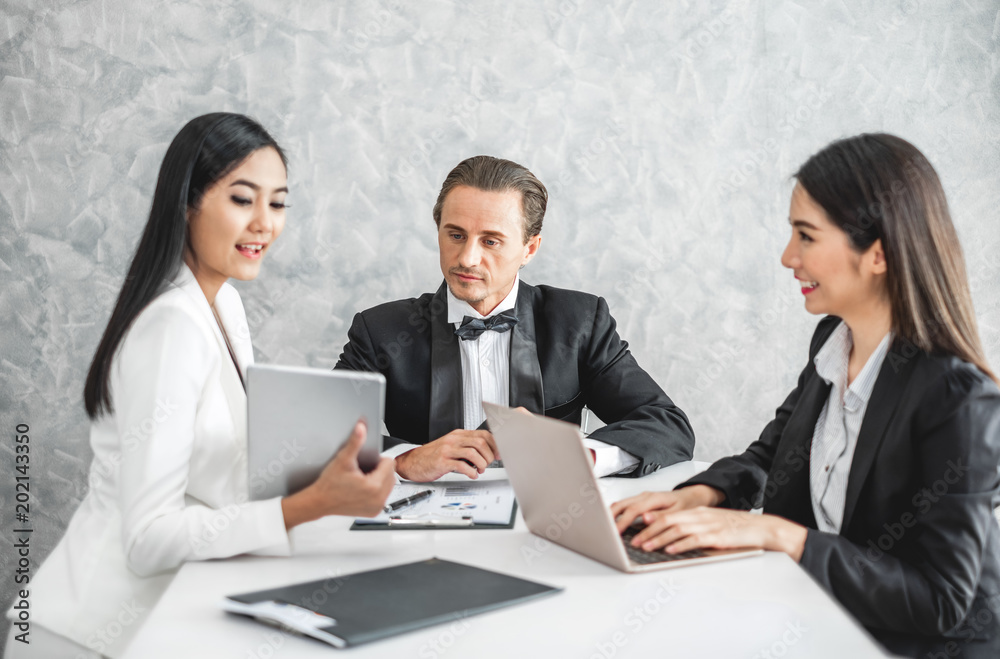 Asian business woman discussing/job interview with colleague/boss for business meeting and presentation Asian business woman discussing/job interview with colleague/boss for business meeting and presentation