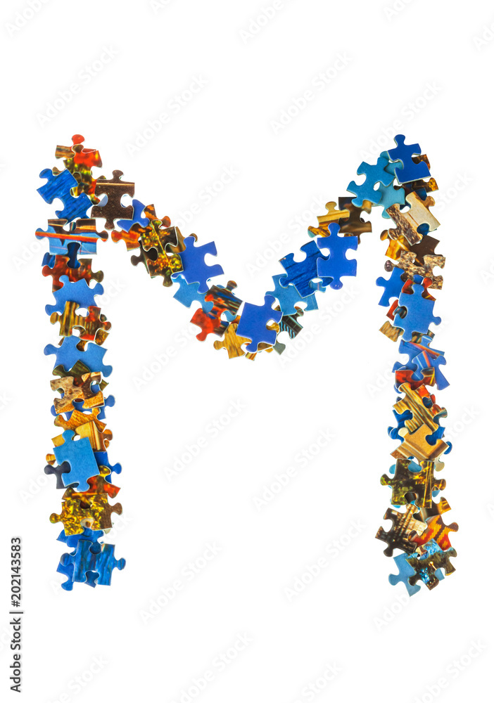 Letter M made of puzzle pieces Letter M made of puzzle pieces