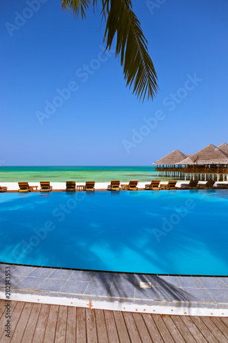 Pool and cafe on Maldives beach