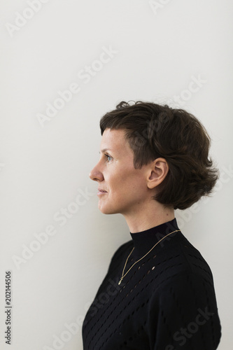 Portrait of mature woman on white background