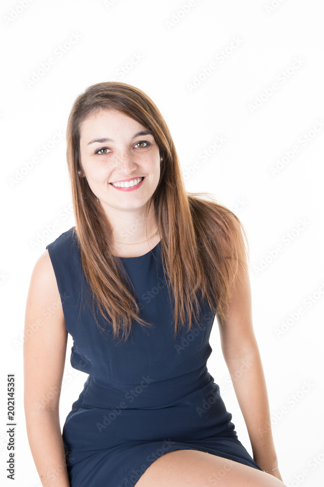 Portrait of a pretty smiling woman posing sitting isolated on a white background Portrait of a pretty smiling woman posing sitting isolated on a white background