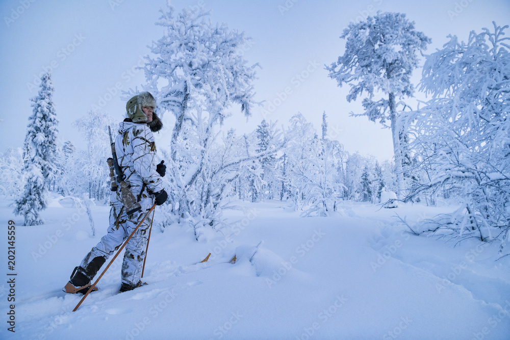 Hunters in winter forest Hunters in winter forest