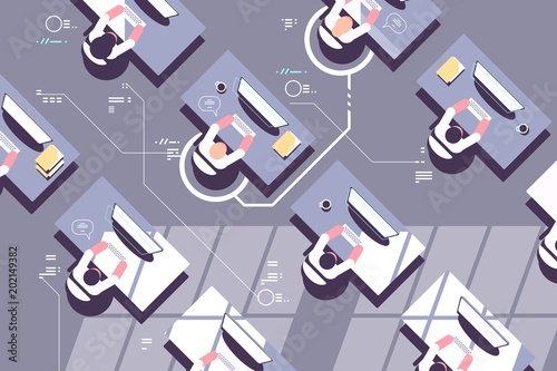 Top view of office workers in workplace
