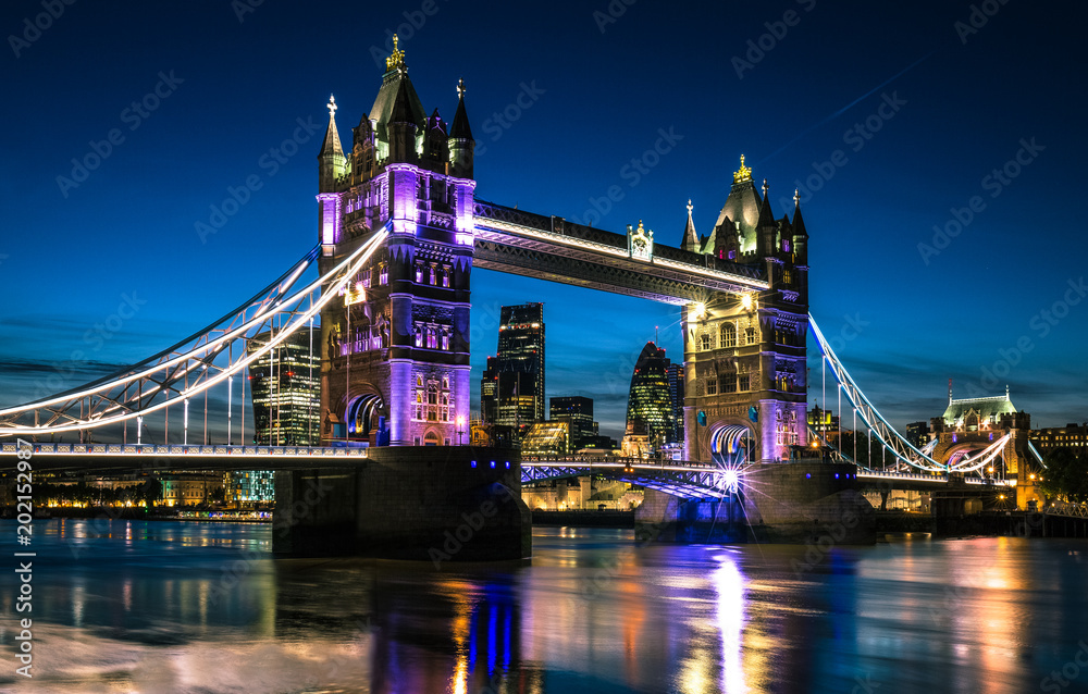 London Tower Bridge And Thames River At Night