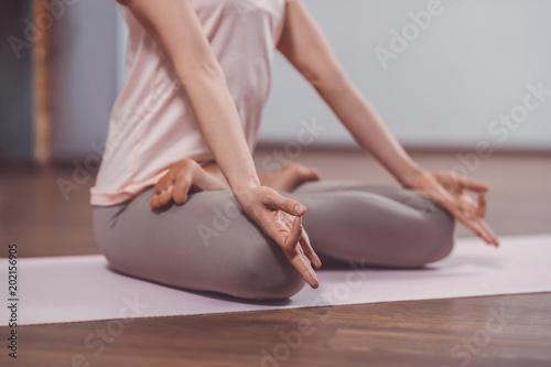 Young woman in lotus pose
