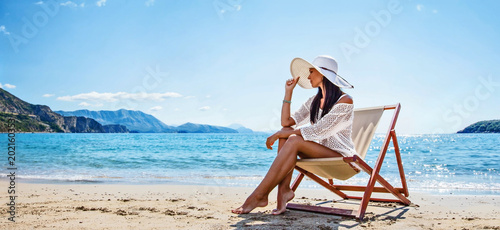Woman Enjoying Sunbathing at Beach