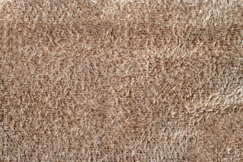 macro texture beige suede. closeup shammy soft leather background