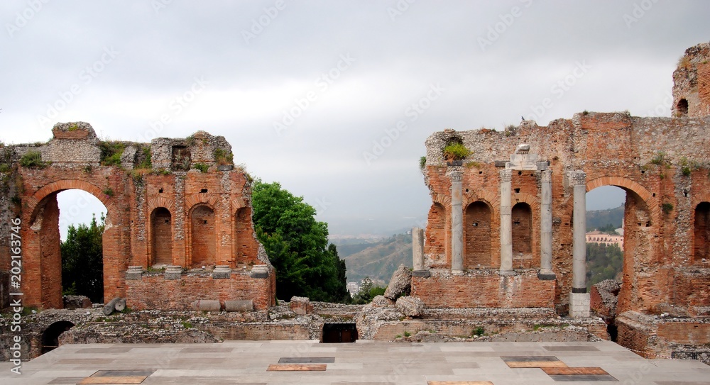 Ancient theatre of Taormina or Teatro antico di Taormina or Teatro Greco, in Sicily, Italy, built for the most part of brick, probably of Roman date, upon the foundations of an older Greek theatre