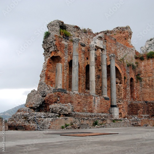 Ancient theatre of Taormina or Teatro antico di Taormina or Teatro Greco, in Sicily, Italy, built for the most part of brick, probably of Roman date, upon the foundations of an older Greek theatre photo