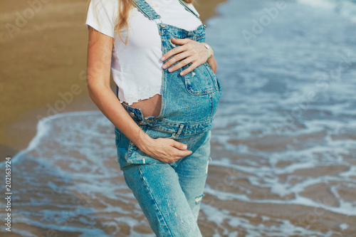Pregnant woman at seaside vacation