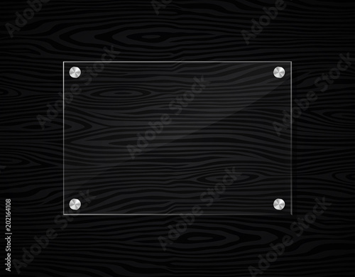 acrylic frame on black wood background photo