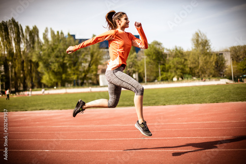 Beautiful day for run. Young woman.