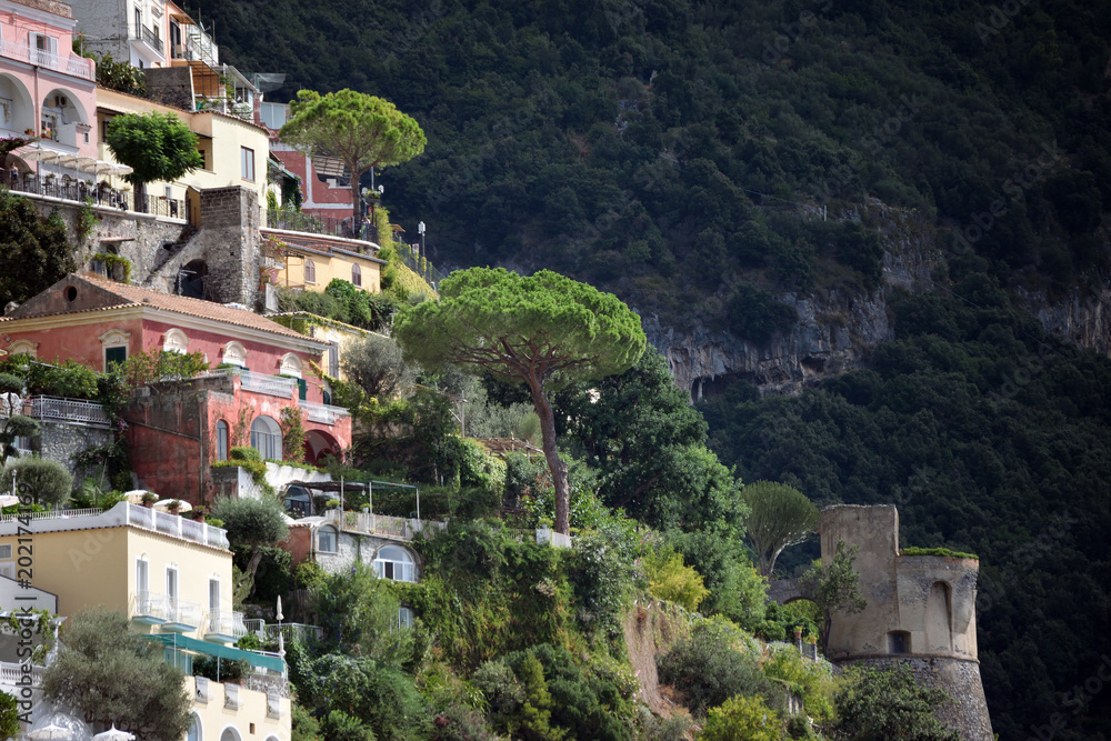 Positano houses on steep hill with tower