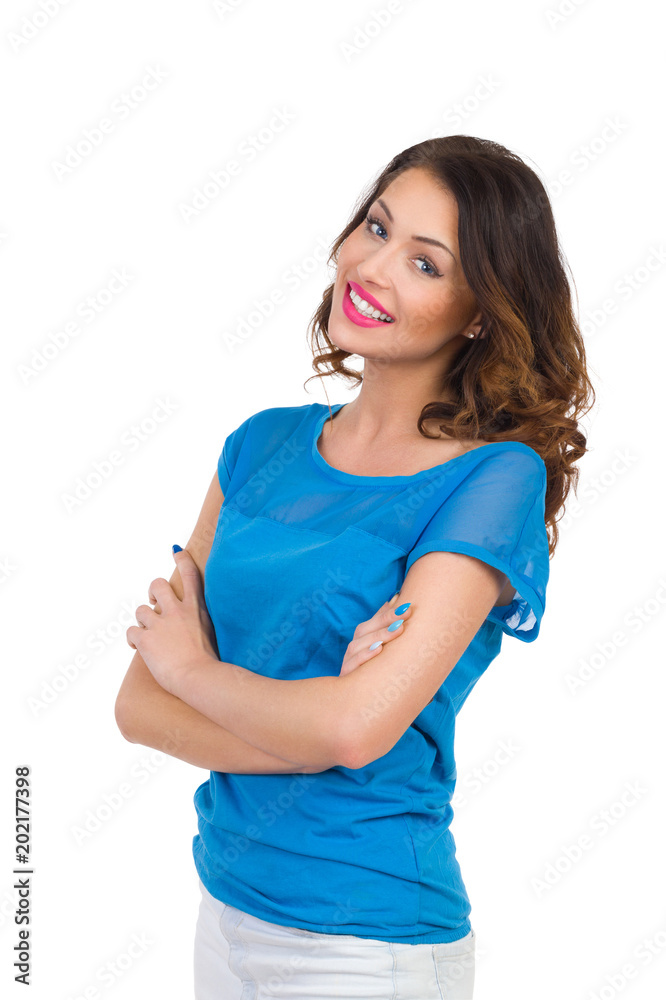 Beautiful Woman In Blue Shirt Is Standing With Arms Crossed And Smiling Beautiful Woman In Blue Shirt Is Standing With Arms Crossed And Smiling