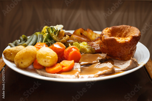 Traditional British roast beef and Yorkshire pudding dinner