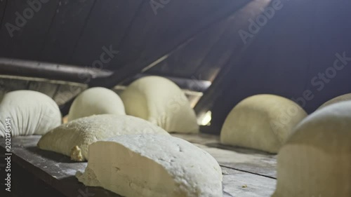 Traditional cheese made - Cheese dairy production at Carpathian Mountains village, Ukraine photo