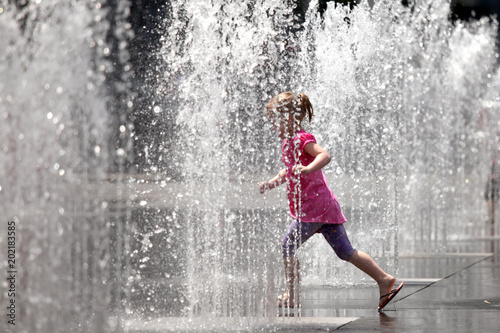 Playing in the Water Fountain - Toronto, Canada © Sam D'Cruz