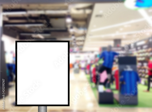 Blank mock up of vertical billboard with copy space for message content in sport shopping mall.