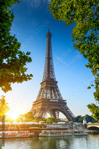 Paris Eiffel Tower at beautiful sunny day. Romantic peaceful atmosphere