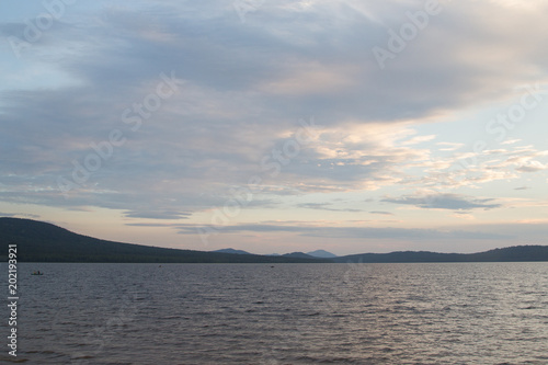 coast of the mountain lake Zyuratkul in the evening