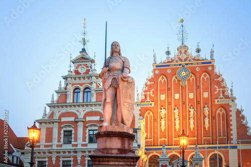 Riga House of Blackheads and Statue of Saint Roland at Dusk