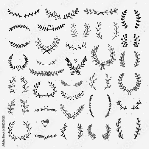 Lovely laurels collection. Beautiful hand drawn wreaths and floral laurels graphic elements for design greeting cards and wedding invitations