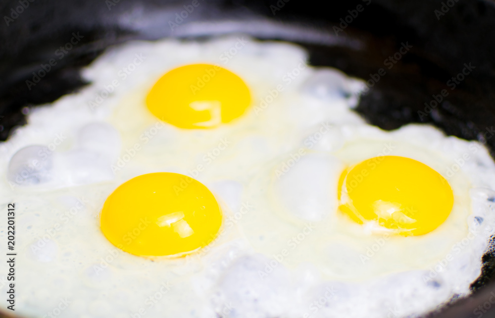 Fried chicken eggs in a frying pan. Fried chicken eggs in a frying pan.