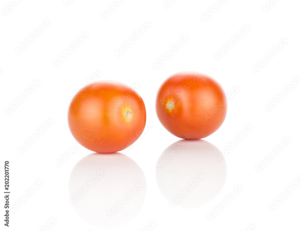 Two red grape cherry tomato isolated on white background ripe.Two red grape cherry tomato isolated on white background ripe. Two red grape cherry tomato isolated on white background ripe.Two red grape cherry tomato isolated on white background ripe.