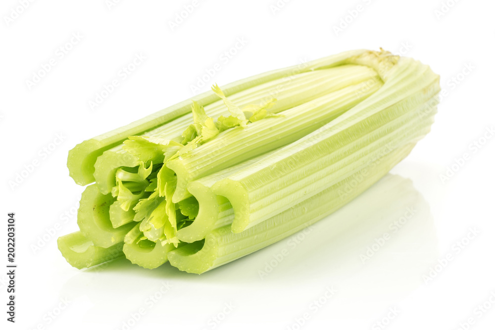 One fresh green celery isolated on white background. One fresh green celery isolated on white background.