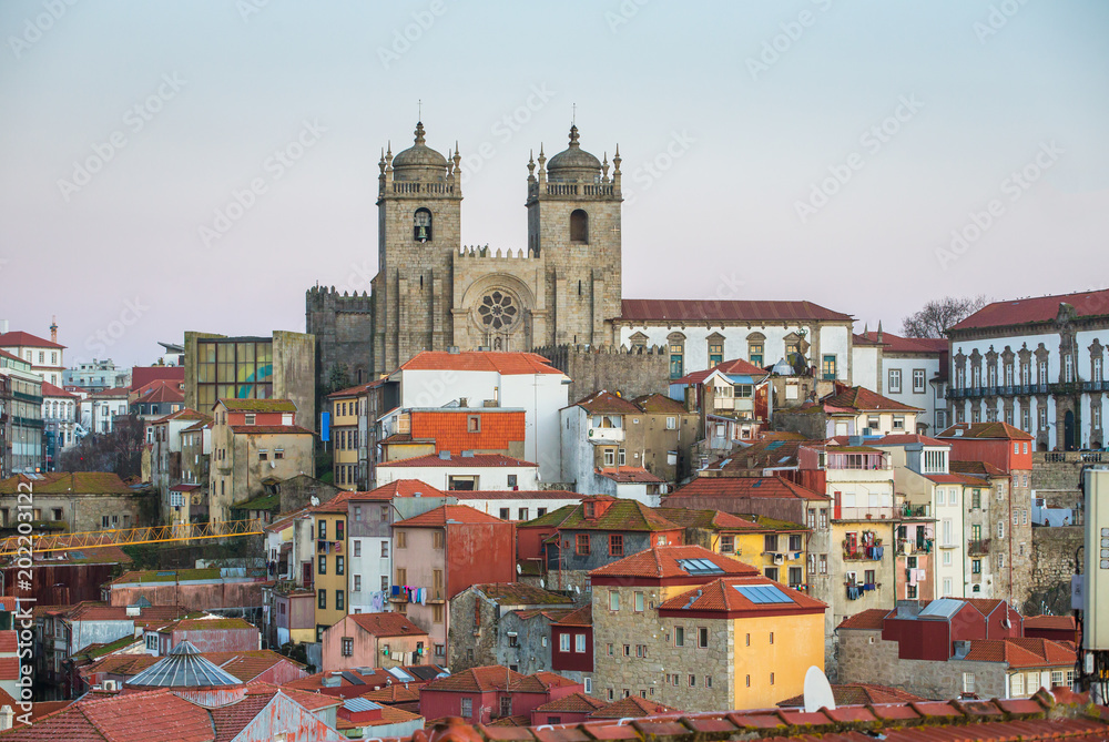Sunset view of Ribeira the old town of Porto with Cathedral, Portugal.