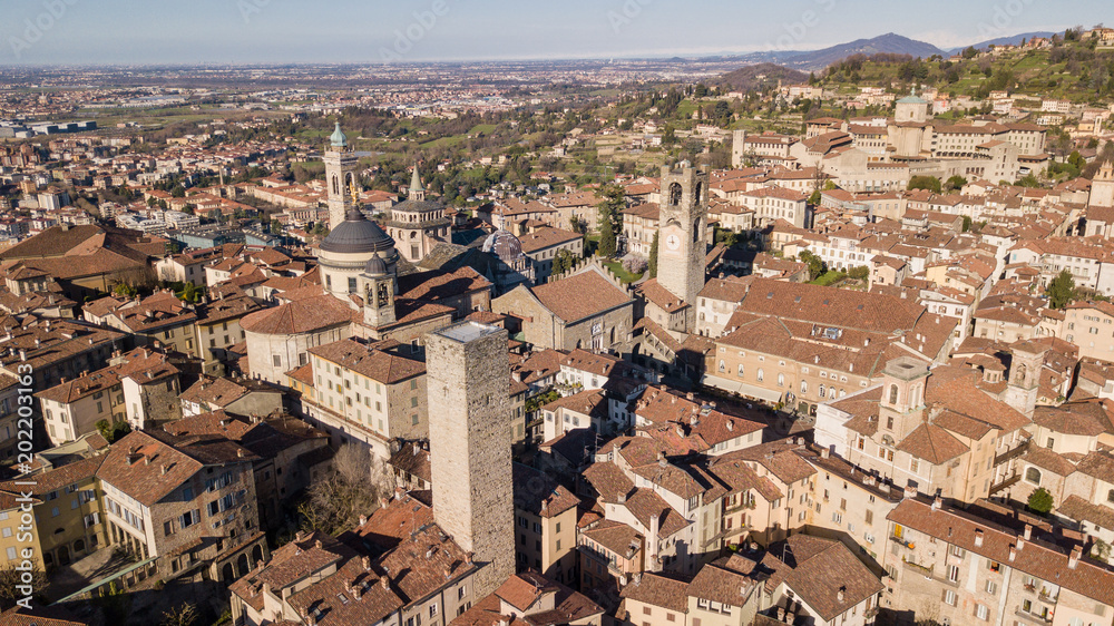 Drone aerial view of Bergamo - Old city. One of the beautiful city in Italy. Landscape on the city center, its historical buildings and towers