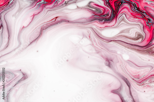 Swirls of marble or the ripples of agate. Liquid marble texture with pink and brown colors. Abstract painting background for wallpapers, posters, cards, invitations, websites. Fluid art.
