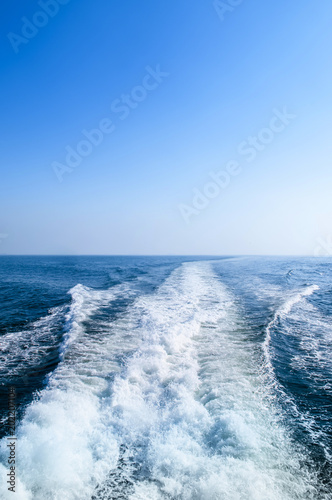 Wake from speedboat in blue ocean Corregidor Island, Manila, Philippines