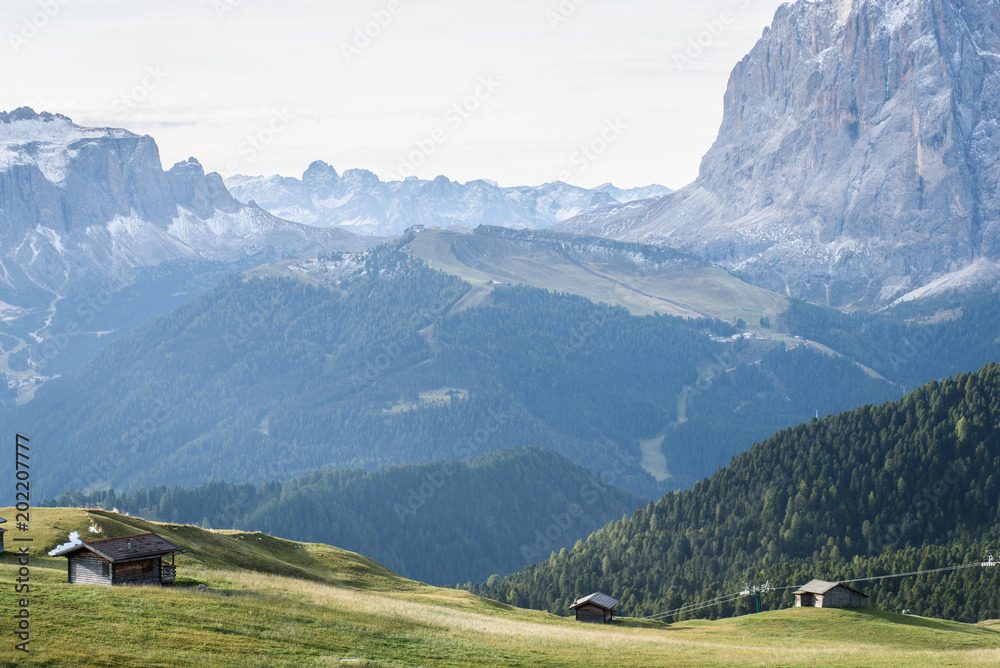 beautiful mountain landscape with wooden house in summer time in Dolomites Apl beautiful mountain landscape with wooden house in summer time in Dolomites Apl