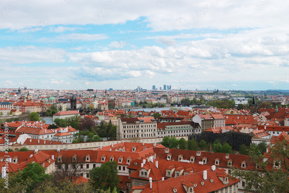 view from top of the capital of the Czech Republic. Red brick roofs of Prague. popular view for tourism