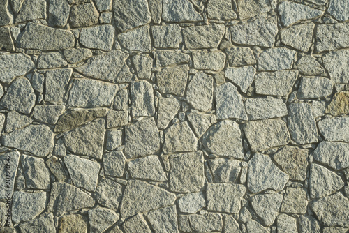 texture stone wall background, masonry of the facade of the castle