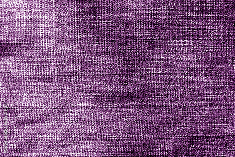 Fototapeta premium Jeans cloth pattern in purple color.