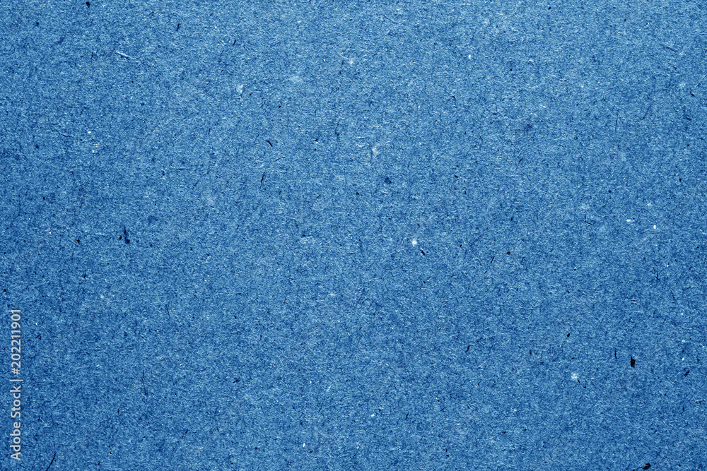 Cardboard paper surface in navy blue color. Cardboard paper surface in navy blue color.