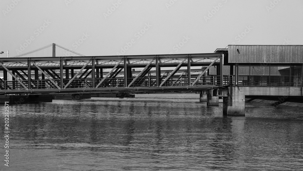 Passenger boarding bridge for access to the boat in a harbor in Lisbon, Portugal Passenger boarding bridge for access to the boat in a harbor in Lisbon, Portugal