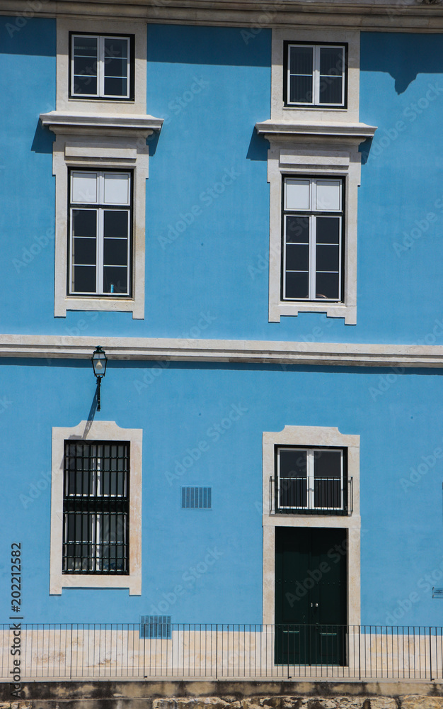 Traditional Portuguese house with blue walls in Lisbon, Portugal