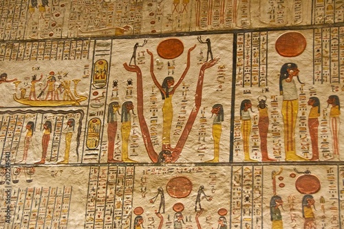 Hieroglyphs on the wall in King Tut's Tomb in the Valley of Kings in Luxor, Egypt photo