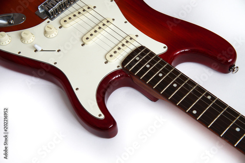 red electric guitar with a white deco