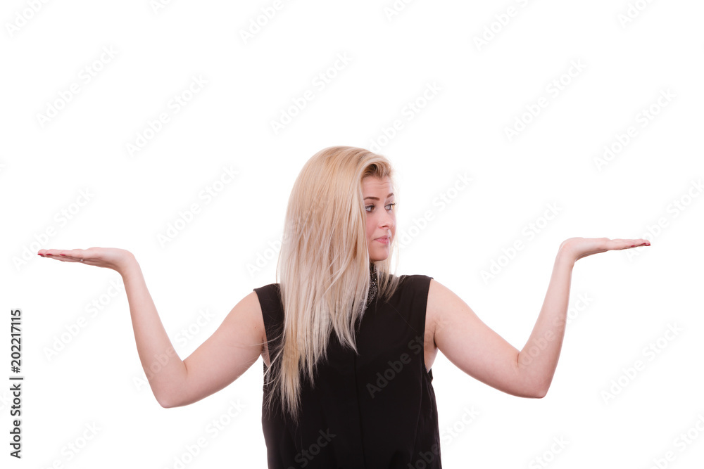 Blonde woman pointing with hands at copyspace Blonde woman pointing with hands at copyspace