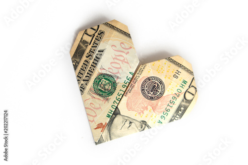 a ten-dollar bill folded in the shape of a heart