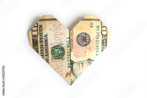 a ten-dollar bill folded in the shape of a heart photo