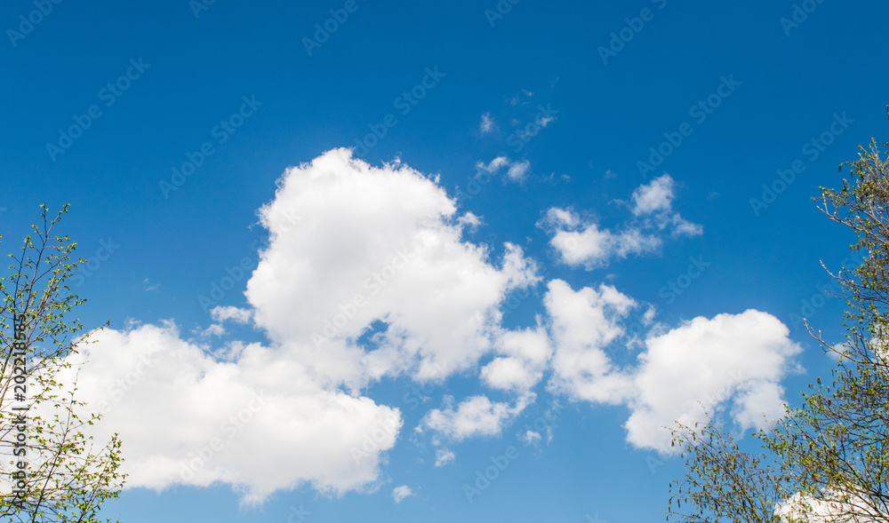 Abstraction of the spring sky,Italy,24 April 2018,spring sky, blue sky with white clouds, background texture wallpaper Abstraction of the spring sky,Italy,24 April 2018,spring sky, blue sky with white clouds, background texture wallpaper