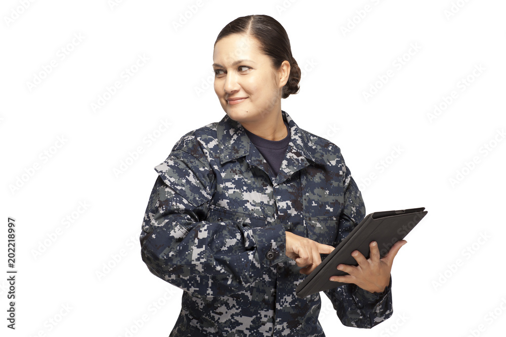 Female officer with digital tablet and looking away Female officer with digital tablet and looking away