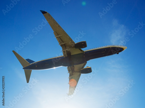 Passenger plane departing in afternoon