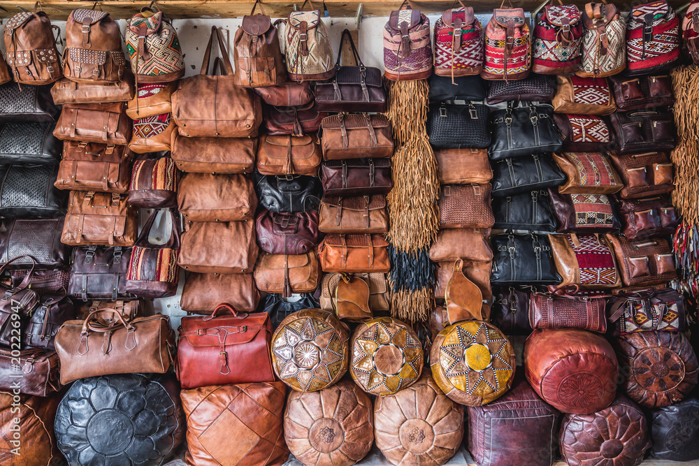 Premium Photo | Bright leather bags on the moroccan market. handmade  souvenirs, fez, morocco.