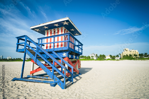 Colorful stars and stripes lifeguard tower on Miami Beach, Florida © lazyllama